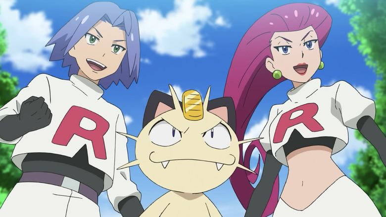 Jessie, James, and Meowth pose