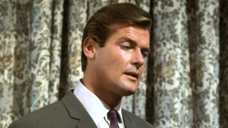 The Saint in a grey suit in The Saint (1962)