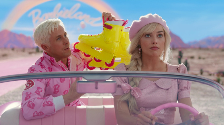 Ken and Barbie in a car