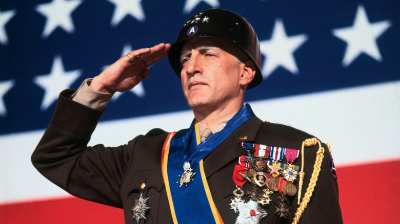 General Patton salutes in front of an American flag in 'Patton' (1970)