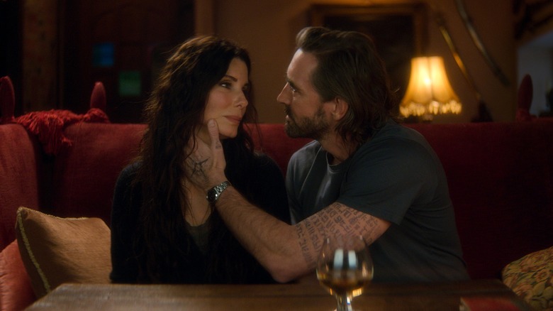 Ian holding Sally's face in Practical Magic 2 (2026)