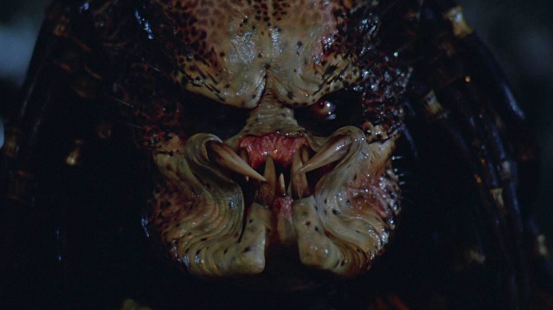 Close-up of the Predator's unmasked face