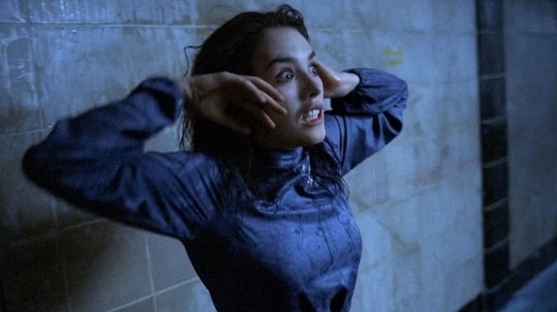 Anna having a moment in a subway tunnel in Possession (1981)