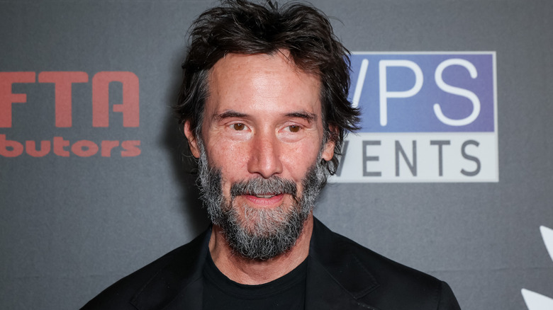 Keanu Reeves smiling at the 2026 Chicano Hollywood Film Festival