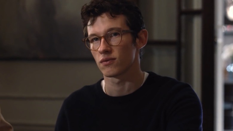 Callum Turner's Thomas Webb listening intently in The Only Living Boy in New York (2017)