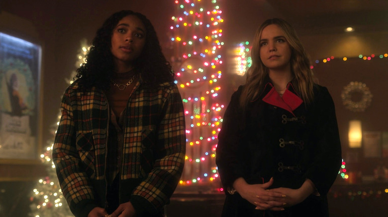Imogen and Tabby standing side by side