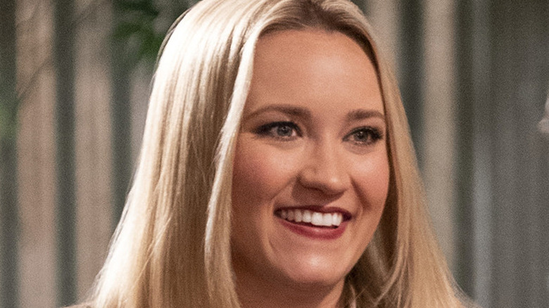 Emily Osment smiling