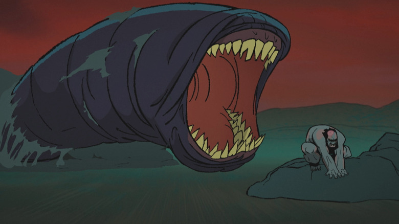 A giant sandworm roaring at Spear