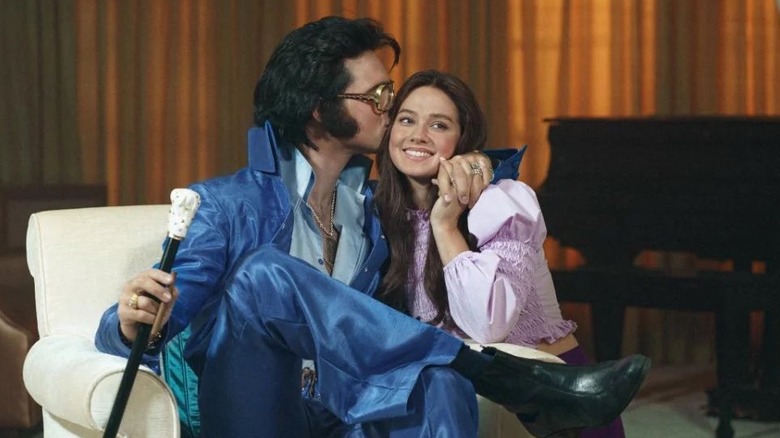 Elvis kisses Priscilla on cheek