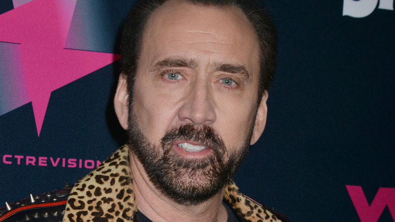 Nicolas Cage smirking