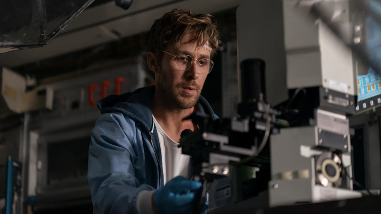 Ryland Grace using a microscope in "Project Hail Mary" (2026)