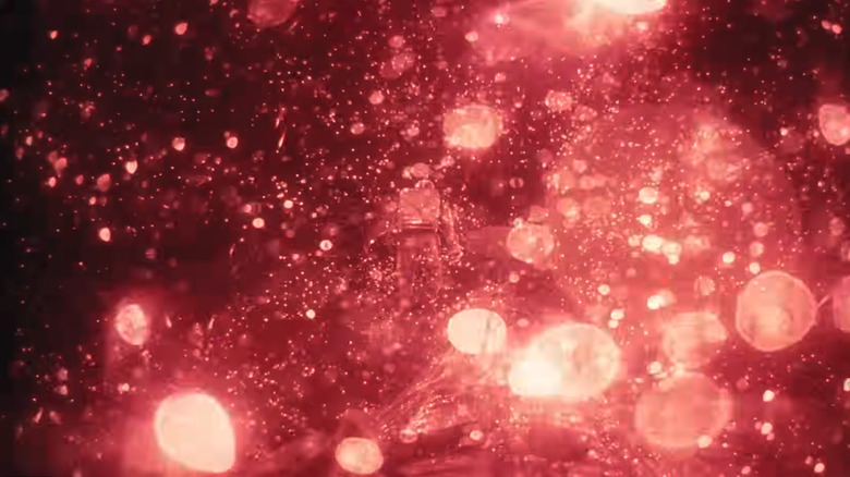 Grace surrounded by Astrophage above Adrian in Project Hail Mary