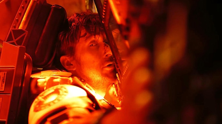 Grace nearly passes out against a control panel in Project Hail Mary