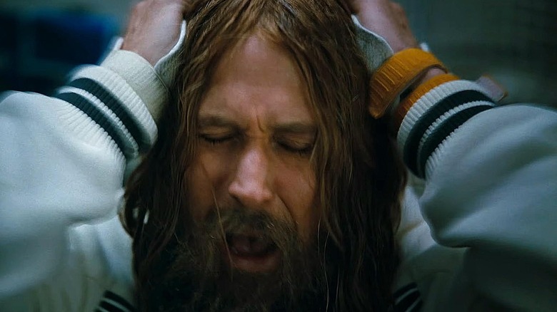 A distressed Grace with long hair in Project Hail Mary