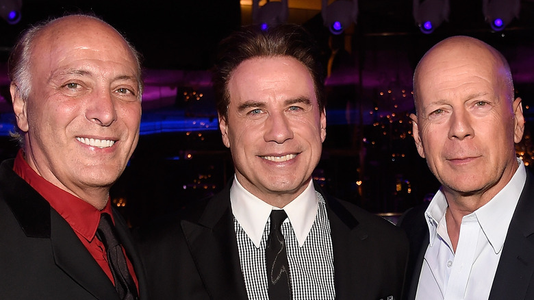 Travolta, Bennett and Willis smiling 