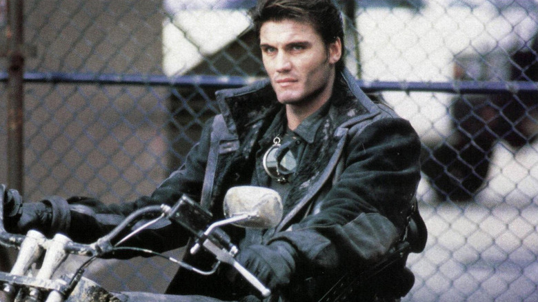 Frank Castle sitting on a motorcycle in "The Punisher" (1989)