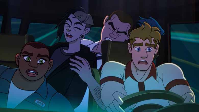 The Q-Force team in a car