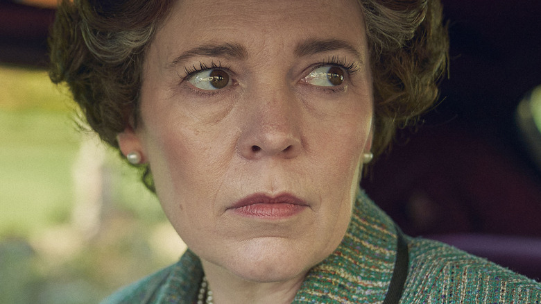 Olivia Colman as Queen Elizabeth II worried