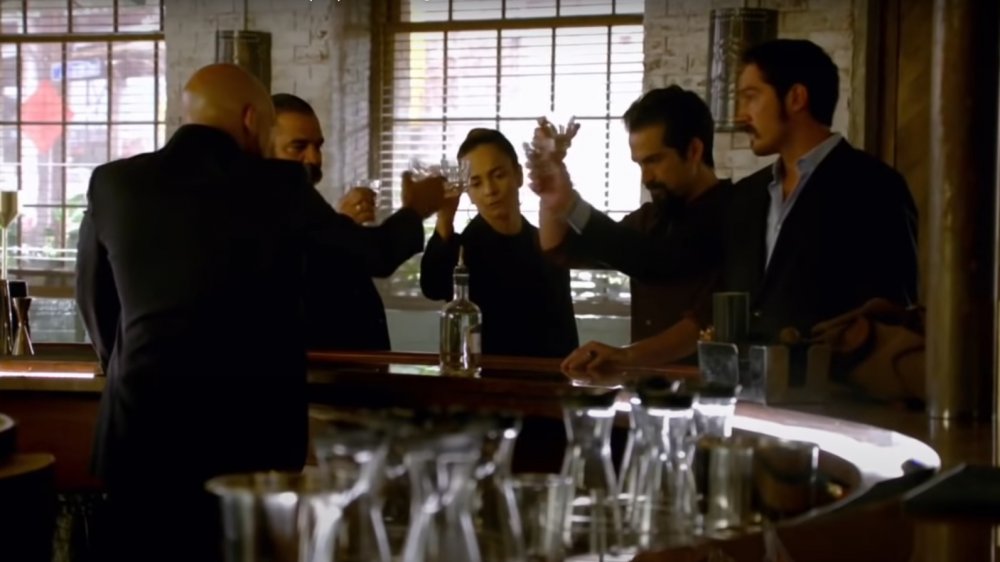 Teresa and her crew celebrate on Queen of the South