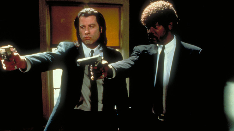 Vincent and Jules point their guns in "Pulp Fiction" (1994)
