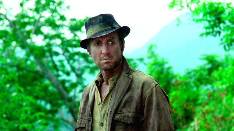 Scanlon stands in the jungle in Sorceror