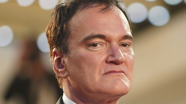 Quentin Tarantino looking into camera 