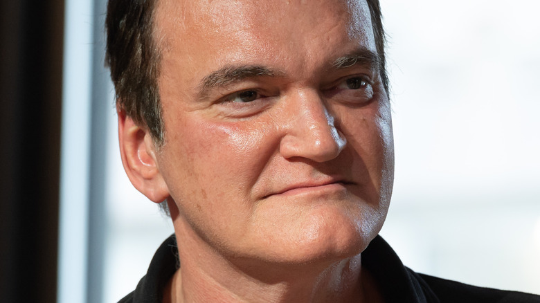 Quentin Tarantino smirking