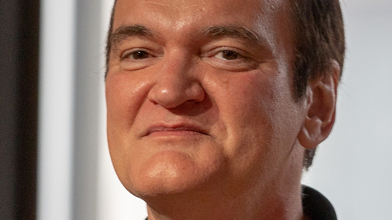 Quentin Tarantino smirking