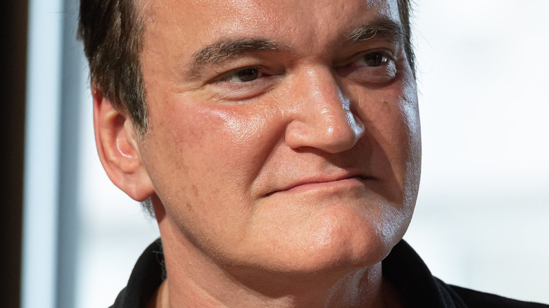 Quentin Tarantino smirking