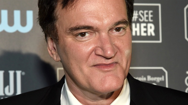 Quentin Tarantino looking into camera 