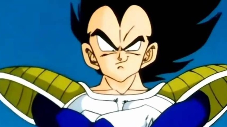 An injured Vegeta smirks