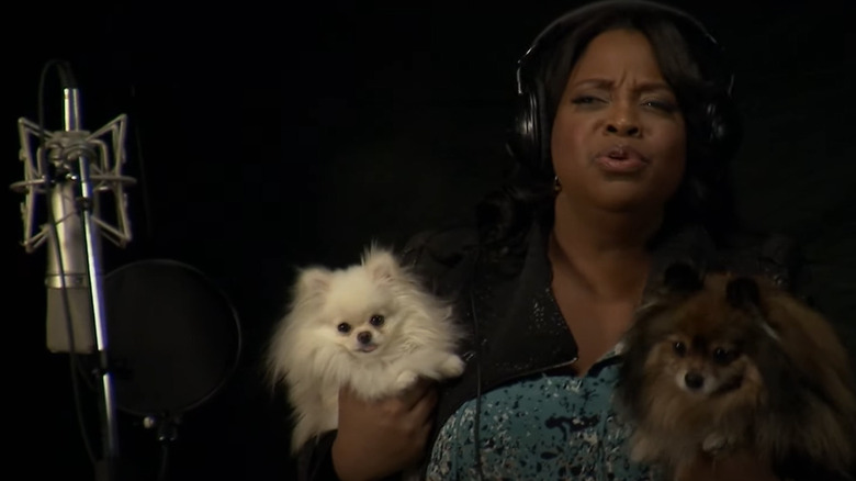 Angie Jordan holding dogs
