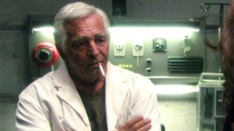 Cottle smoking a cigarette