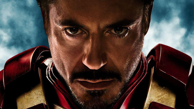 Tony Stark in Iron Man suit, looking determined