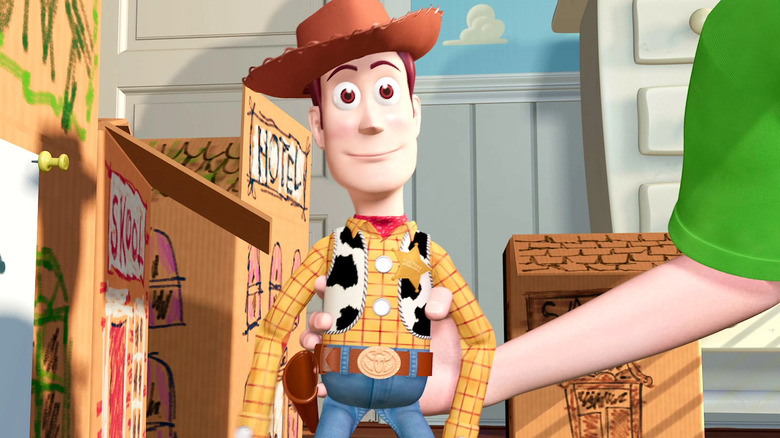 Andy holding Woody up in Toy Story