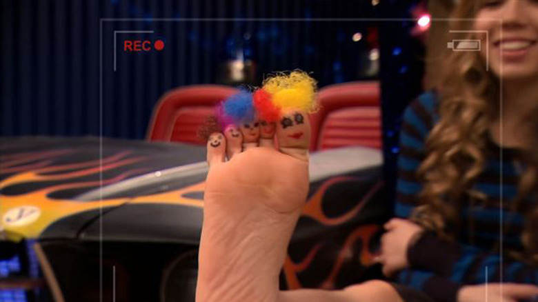 Toes with wigs and faces