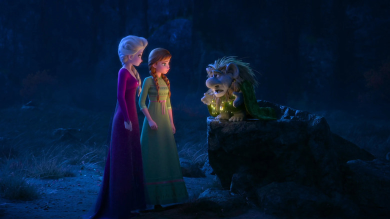 Grand Pabbie talking to Anna and Elsa