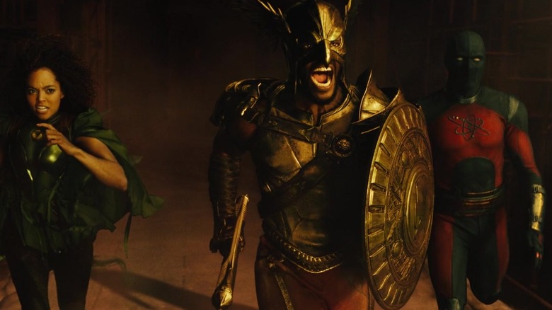 Hawkman, Cyclone and Atom charge forward