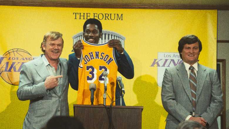 John C. Reilly, Quincy Isaiah and Jason Clarke at a press conference in "Winning Time"