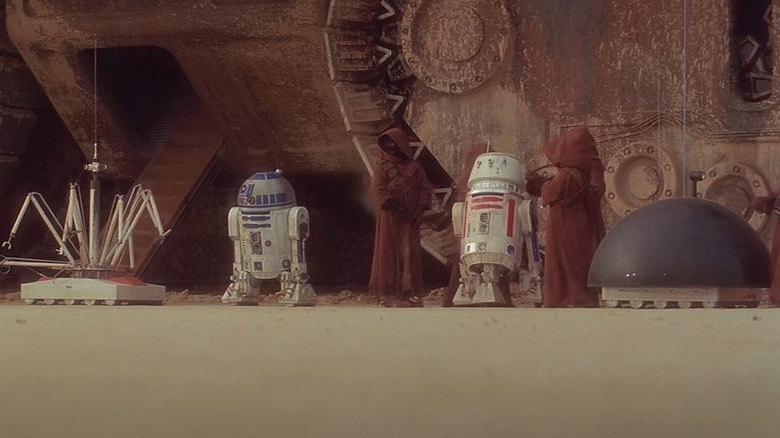 Jawas preparing droids for sale
