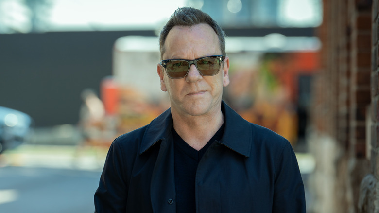 Kiefer Sutherland wearing sunglasses