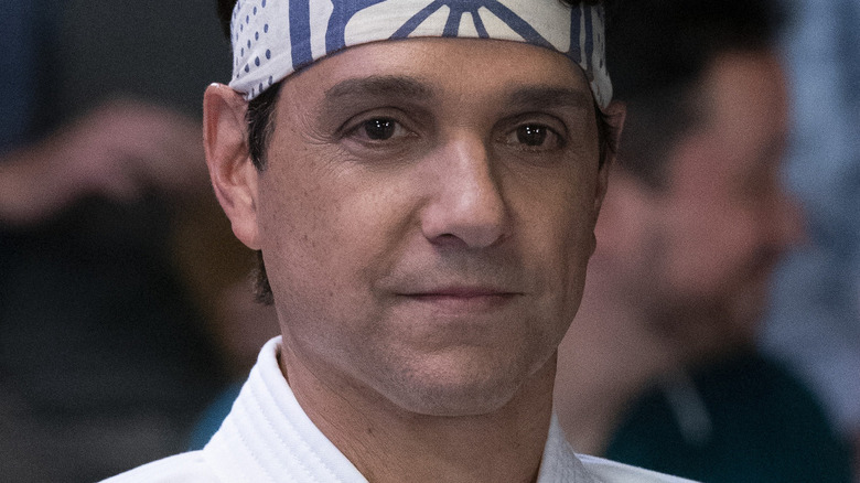 Ralph Macchio wearing headband and gi