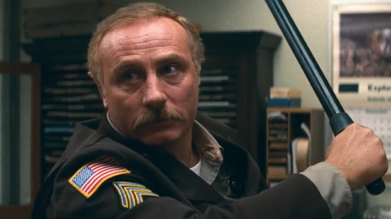 Art Galt brandishes his baton in "First Blood"