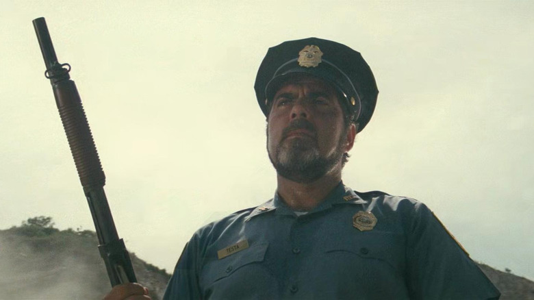 Testa staring with his gun in "Rambo: First Blood Part II" (1986)