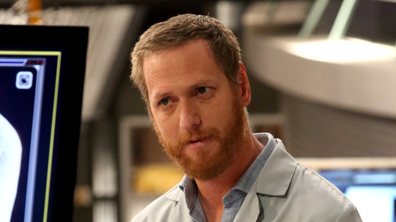 Wells standing in lab