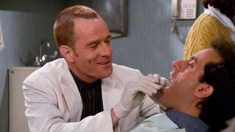 Whatley looking into Jerry's mouth