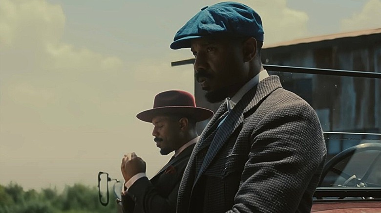 Smoke and Stack standing around in Sinners (2025)