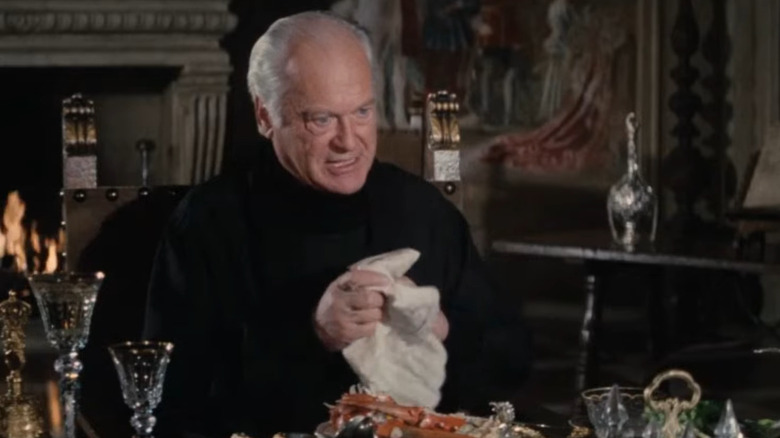 Karl Stromberg dines in his aquatic palace