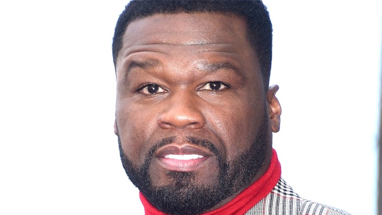 50 Cent red turtleneck