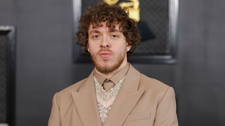 Jack Harlow wearing brown suit